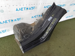 The rear left wing arch of a Chevrolet Malibu 16-25 is sawn off, black, dented