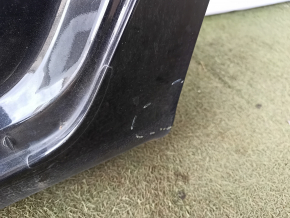 The rear left wing arch of a Chevrolet Malibu 16-25 is sawn off, black, dented