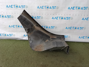 The rear left wing arch of a Chevrolet Malibu 16-25 is sawn off, black, dented
