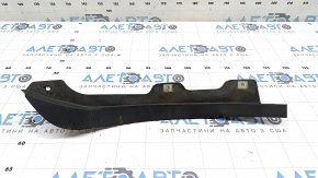The left front bumper mudguard of the Audi A4 B8 08-16 is worn and dented
