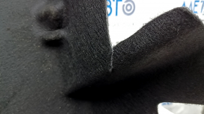 The trunk floor trim of the Mercedes X167 GLS 450 580 20-26 is black, torn, and needs dry cleaning