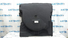 The trunk floor trim of the Mercedes X167 GLS 450 580 20-26 is black, torn, and needs dry cleaning