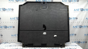 The trunk floor of a BMW X5 G05 19-26 is black, there are scratches on the handle, it needs cleaning