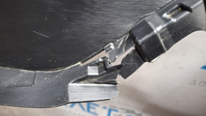 The rear bumper of a Toyota Sienna 21-26 is bent, scuffed, and the mount is broken