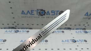 Front left door sill insert BMW X7 G07 19-26 chrome with backlight, individual, scratches, bump