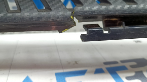 The upper grille of the front bumper of the Chevrolet Equinox EV 24-26 is broken in half, there is no fragment, there is a crack
