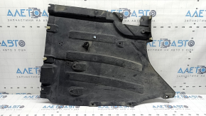 The rear right underbody protection of the BMW X3 G01 18-24 is torn, dented, missing a fragment