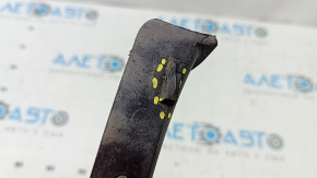 The right front bumper mudguard for a Jeep Cherokee KL 19-23 is worn, the mount is dented and bent
