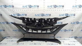 The radiator grille assembly for a Toyota Prius 50 Prime 17-19 with an emblem, under a radar, without parking sensors, cracked, chipped, and a broken mount