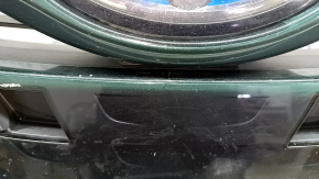 The radiator grille assembly for a Toyota Prius 50 Prime 17-19 with an emblem, under a radar, without parking sensors, cracked, chipped, and a broken mount