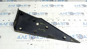 The right rear fender trim of a Toyota Prius 50 Prime 17-22 has peeling paint and is cracked