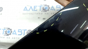 The right rear fender trim of a Toyota Prius 50 Prime 17-22 has peeling paint and is cracked