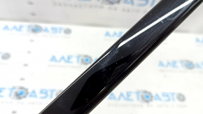 Molding door-glass central front left Audi Q3 83A 19-25 black gloss, worn, scratches