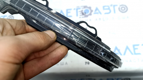 The left side mirror turn signal repeater for Audi A4 B9 17-25 is cracked