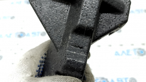 The front bumper absorber of the Audi Q3 83A 19-25 is dented