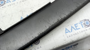 The lower grille of the front bumper of the Hyundai Ioniq 17-22 is gray, scratches, a fragment is missing, cracked, the mount is cracked