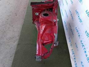 The front left quarter of a Toyota Prius 50 16-22 is sawn off with the central pillar, red, the pillar is dented