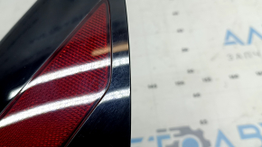 Reflector on the rear right wing of Tesla Model Y 20-25, broken mount, scratches