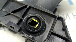 The rear bumper mount, outer right, Tesla Model Y 20-25, the latches are broken