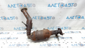 The inlet pipe with the catalytic converter of Nissan Rogue 21 2.5 has a torn corrugation and the catalytic converter is crushed