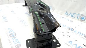 The rear bumper reinforcement for the Audi Q3 83A 19-25 is dented