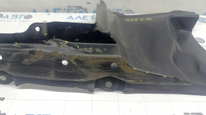 The left side engine protection of Toyota Prius 50 16-18 is worn, torn, and dented