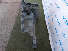 The front right quarter of Toyota Prius V 12-17 is sawed off, green, butt