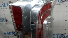 Left headlight Toyota Prius 30 12-15 rest, moisture and cracks under the glass