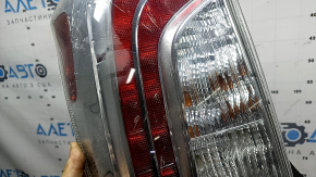 Left headlight Toyota Prius 30 12-15 rest, moisture and cracks under the glass