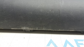 Upper left threshold of Tesla Model Y 20-25 structure, scratches