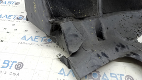 The front right rear fender liner of the BMW X5 F15 14-18 is dented and torn