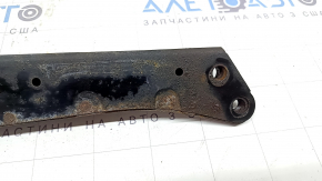 The front subframe reinforcement, left, Toyota Prius 30 10-15, is rusty