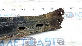 The front subframe reinforcement, left, Toyota Prius 30 10-15, is rusty