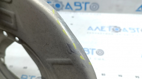 Tesla Model Y 20-25 front left brake disc cover is dented