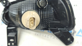 Turn signal in the front right bumper of a 19-21 Kia Forte