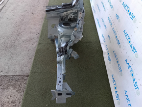 The front left quarter of a Toyota Prius V 12-17 was sawed off with the central pillar, green, dented