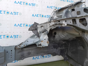 The front left quarter of a Toyota Prius V 12-17 was sawed off with the central pillar, green, dented
