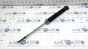 The rear right shock absorber of Toyota Prius 30 10-13 is dented and rusty