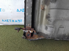 The trunk trough of Toyota Camry v40 07-11 is drilled out, corrosion
