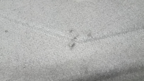 The hood insulation of the Audi A6 C7 12-18 is worn and dented