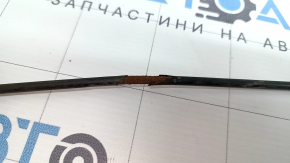 The insulation on the front hood release cable for a Volvo XC90 16-26 has dried out