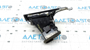 The front air duct deflector for the driver's side of the Audi A6 C7 16-18 is black, with a chrome trim, the trim fasteners are broken