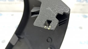 The driver's seat control cover for the Audi A6 C7 12-18 is black, with scratches and a crack in the mount
