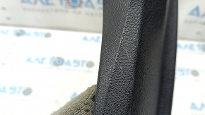 The driver's seat control cover for the Audi A6 C7 12-18 is black, with scratches and a crack in the mount
