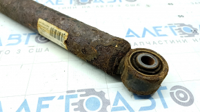 The rear right shock absorber of the Audi A6 C7 12-18 is rusty