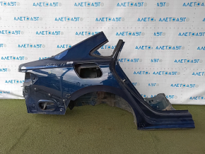 The quarter panel of the rear right wing of a VW Passat 20-22 was sawed off. Blue, with bumps