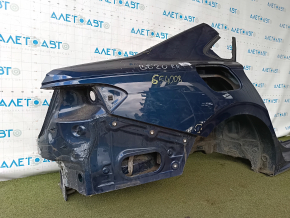 The quarter panel of the rear right wing of a VW Passat 20-22 was sawed off. Blue, with bumps