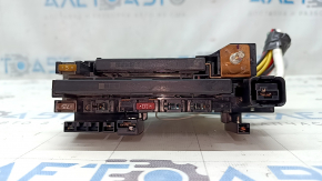 The fuse box under the hood, left, Toyota Camry v50 12-14 usa, is large