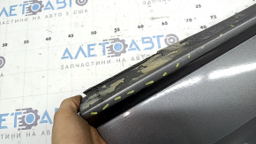 Lower front left door trim for Audi Q8 19-26 graphite, pressed, paint peeling off