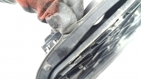 The fuel filler flap housing of the Audi Q5 80A 18-25 has a broken mount and a torn seal